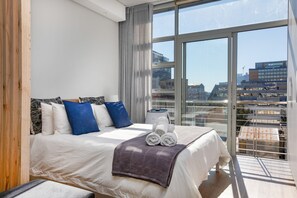In-room safe, iron/ironing board, free WiFi, bed sheets - Backup-Powered City Apartment with Breathtaking Views on Popular Bree Street  (Cape Town)