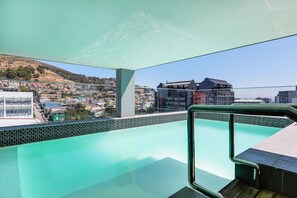 Outdoor pool - Backup-Powered City Apartment with Breathtaking Views on Popular Bree Street  (Cape Town)