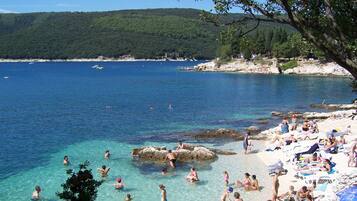 Beach nearby, sun loungers