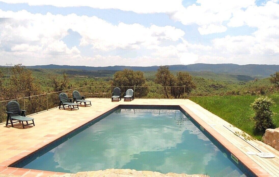 The swimming pool area has an excellent view