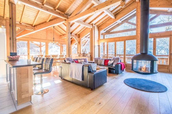 the lounge area showing the doors onto the balconies