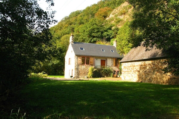 Summer- warm outside and cool in. Hillside alive with colour and wildlife.