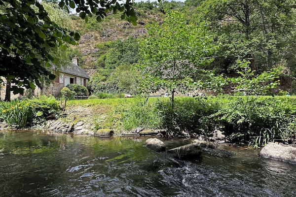 view of house from river and near plunge spot