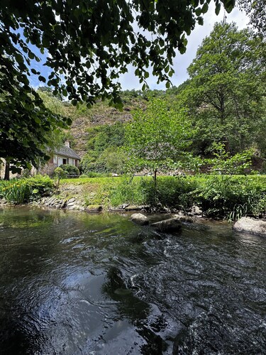 Secluded Cottage retreat by a river, woods, hillside with extensive grounds