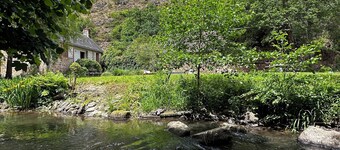 Delightful stone house with peaceful riverside location