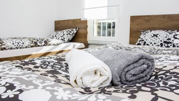 2 chambres, chambres insonorisées, fer et planche à repasser