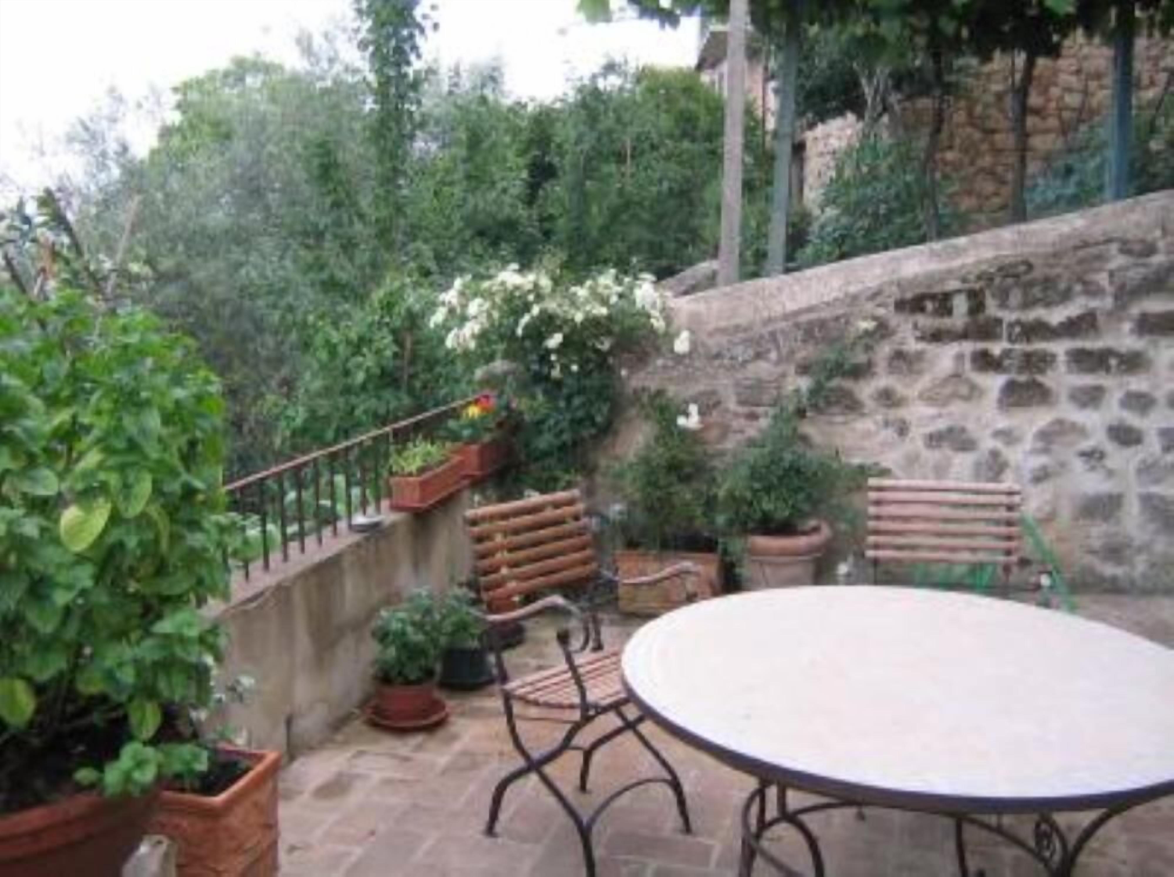Townhouse in ancient tower in medieval Cetona