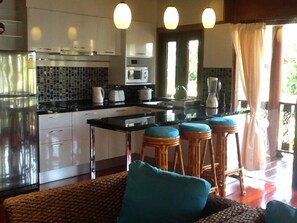 Fridge, microwave, stovetop, coffee/tea maker