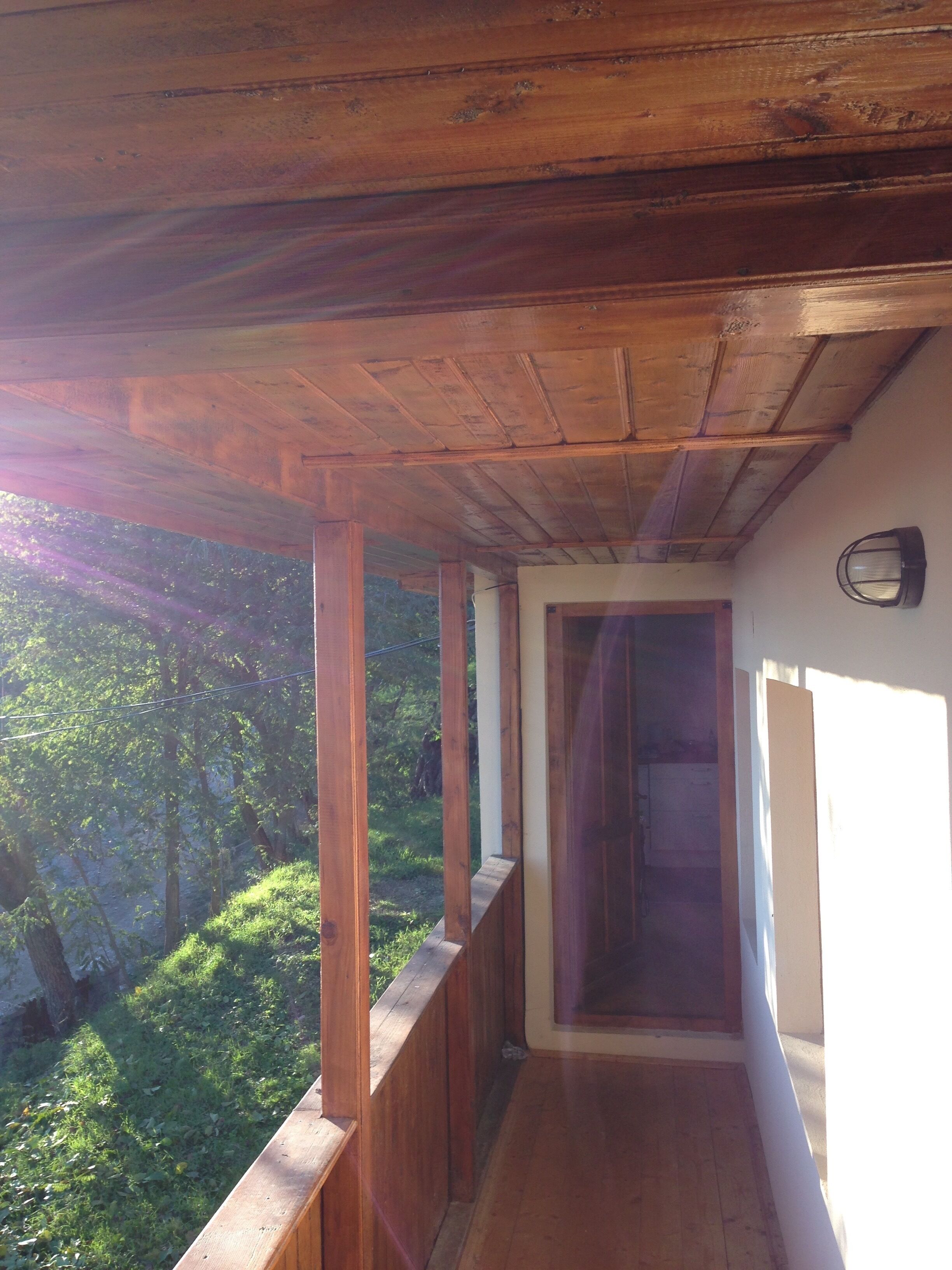 Balcony and entrance door.