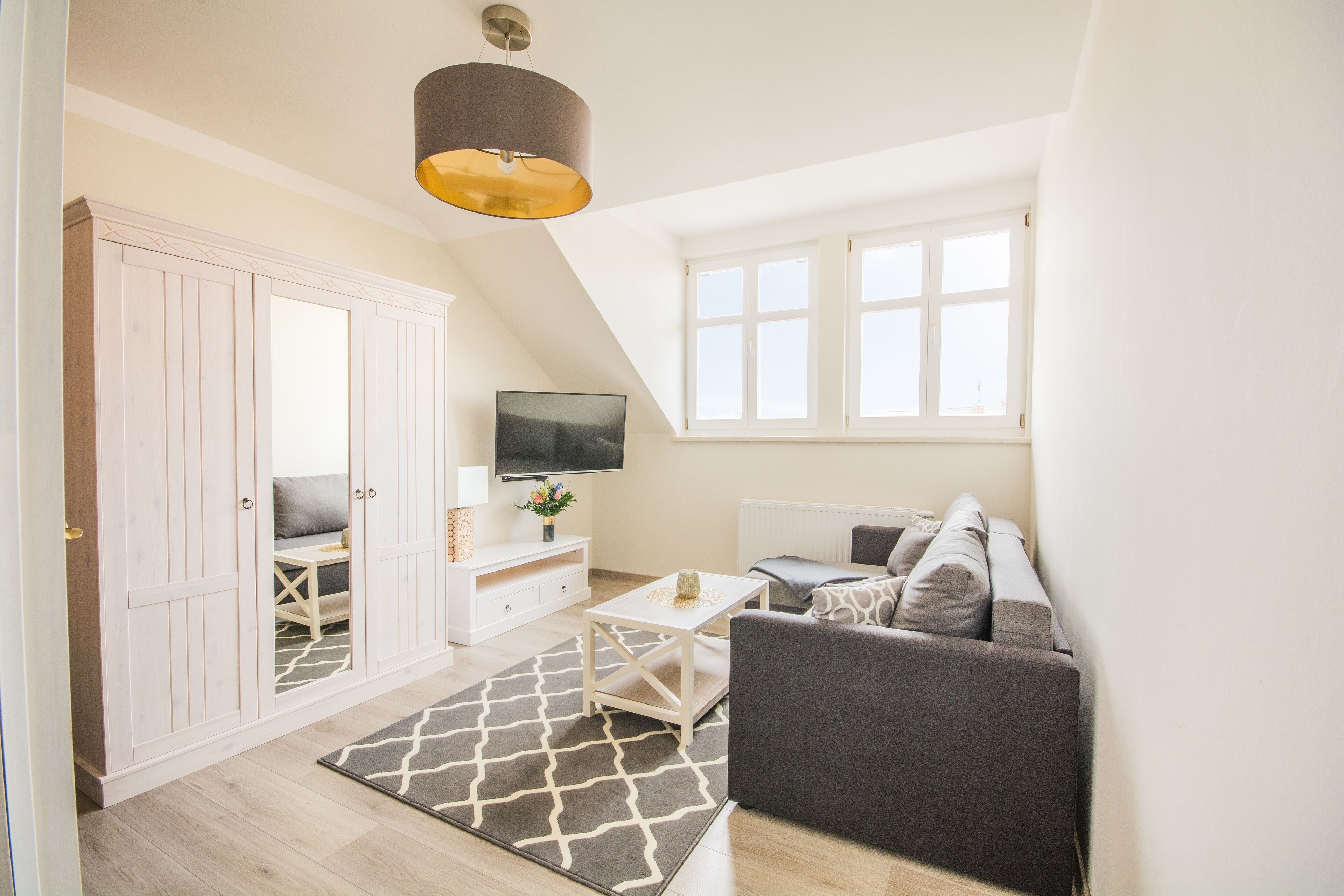 Wohnbereich im Schlafzimmer mit Schlafsofa