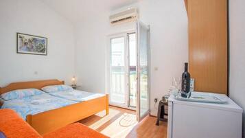 2 dormitorios, tabla de planchar con plancha, wifi y ropa de cama