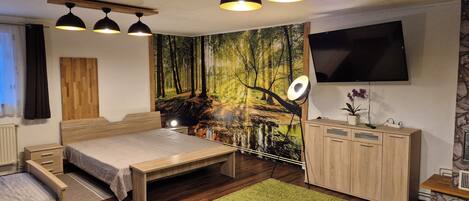 2 quartos, ferros/tábuas de passar roupa, berço de viagem