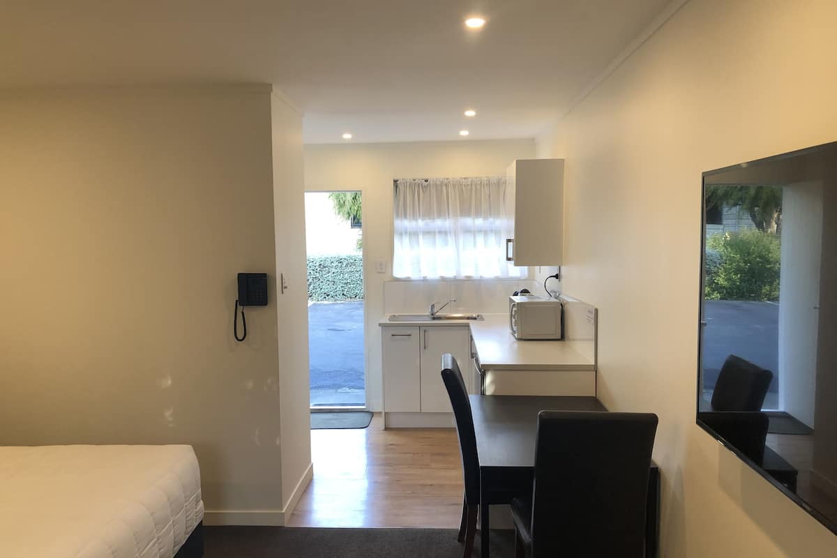 Studio Unit | Living area | 55-inch LCD TV with premium TV channels, TV