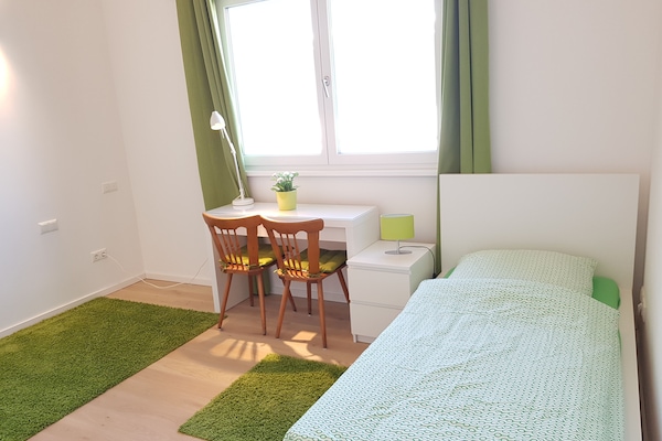 Cityloft Smaragd mit grünem Schlafzimmer