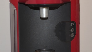 A red Bosch coffee maker with a black control panel and a single coffee pot. - Studio, Graz center, quiet (Graz)