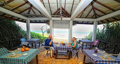 Habitación doble en la playa con desayuno.