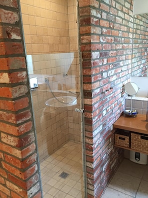 Bathtub, hair dryer, towels