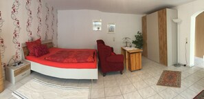 1 bedroom, desk, iron/ironing board, travel crib