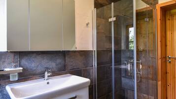 Hair dryer, towels, soap, toilet paper