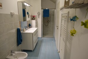 Hair dryer, towels, toilet paper
