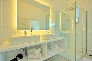 Bathtub, hair dryer, towels, soap