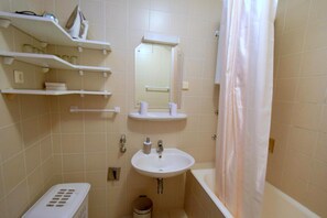 Apartment, 3 Bedrooms | Bathroom | Bathtub, towels, toilet paper