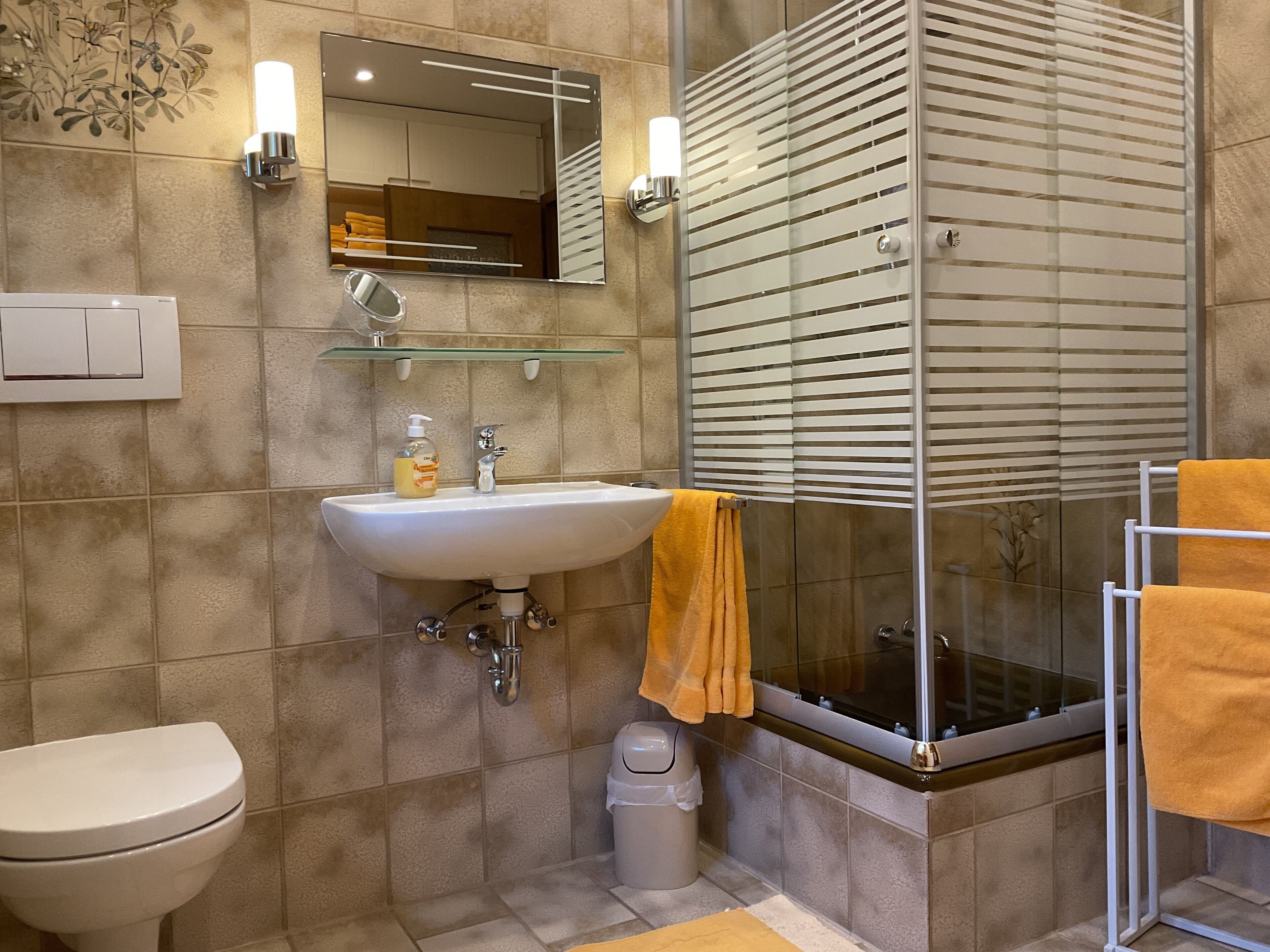 Shower, hair dryer, bathrobes, towels