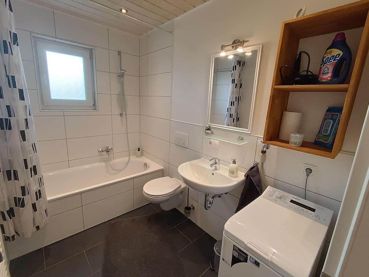 Bathtub, hair dryer, towels