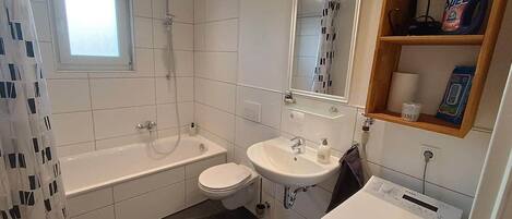 Bathtub, hair dryer