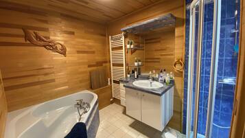 Combined shower/tub, hair dryer, towels, soap