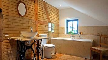 Bathtub, hair dryer, towels, soap