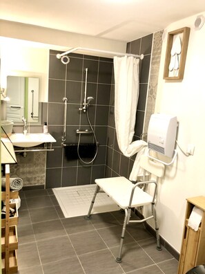 Shower, hair dryer, towels, soap