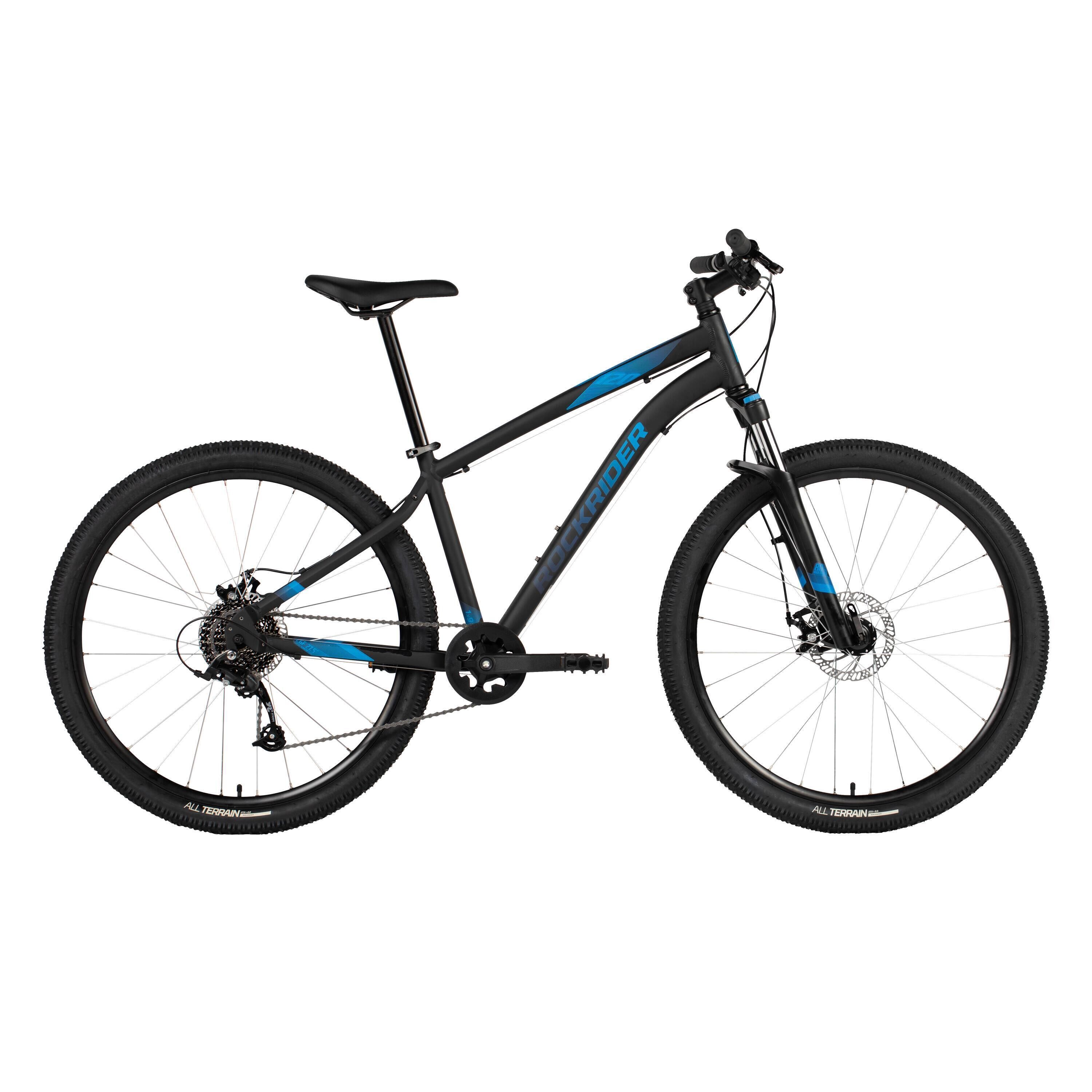 A mountain bike with a black frame and blue accents, equipped with a front suspension fork, disc brakes, and a chain drive system.