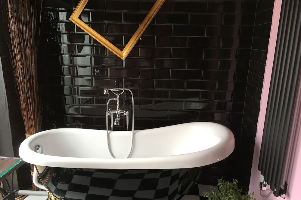 A bedroom with private bathroom. Charm and tranquility