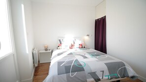 1 dormitorio, tabla de planchar con plancha, wifi y ropa de cama