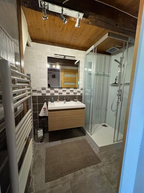 Shower, hair dryer, towels, soap