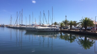 Detached house divided into 4 fully-equipped apartments.
