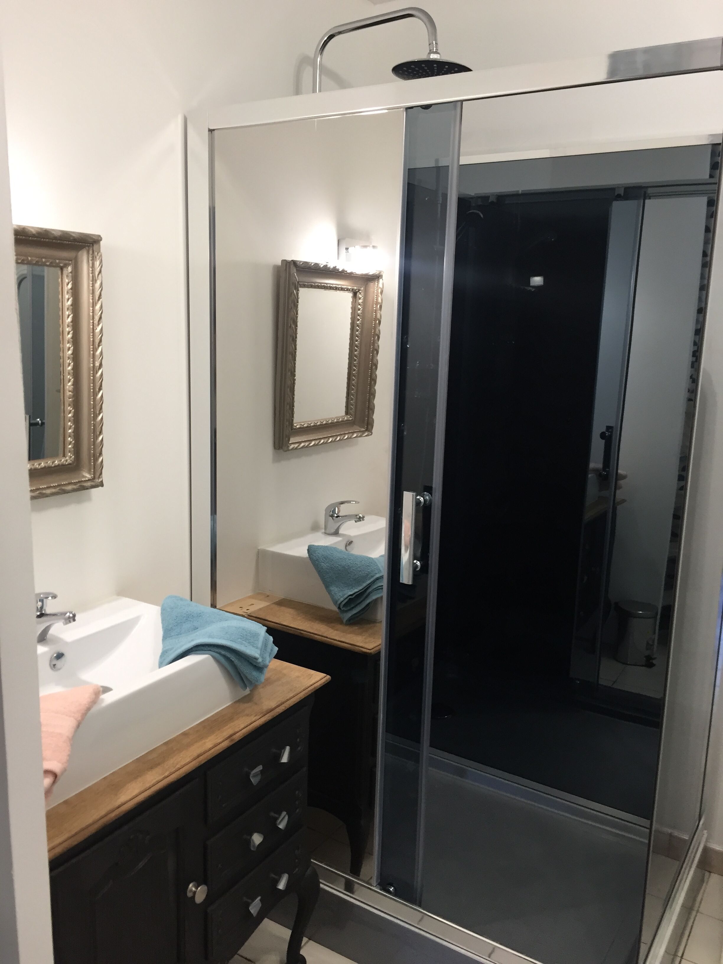 Bathtub, hair dryer, towels