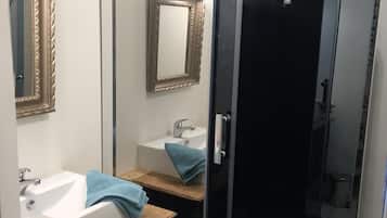 Bathtub, hair dryer, towels