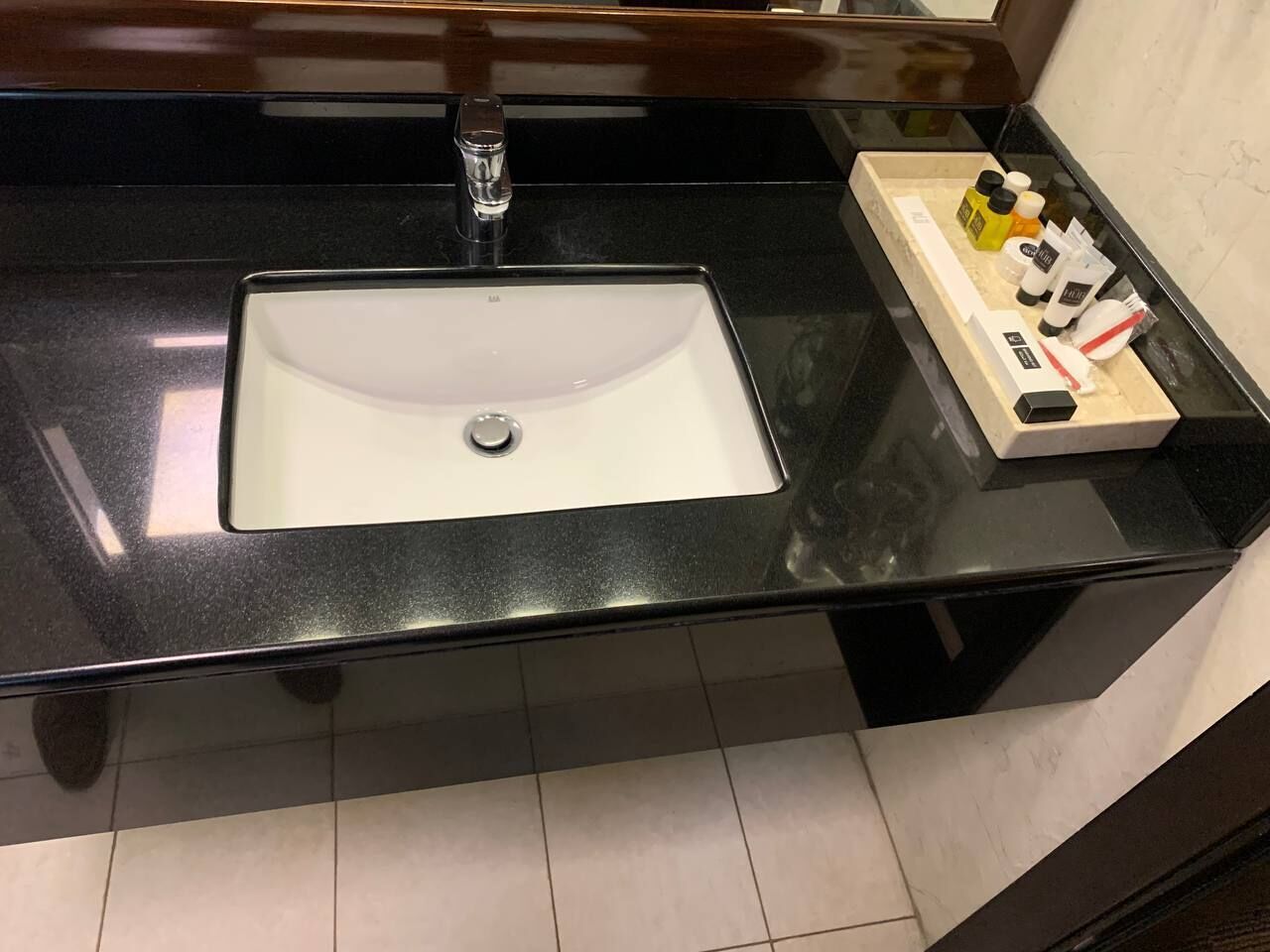 combined shower/bathtub, free toiletries, hair dryer, slippers