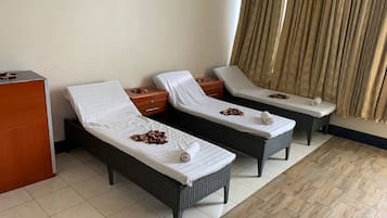 Massages aux pierres chaudes, massages des tissus profonds