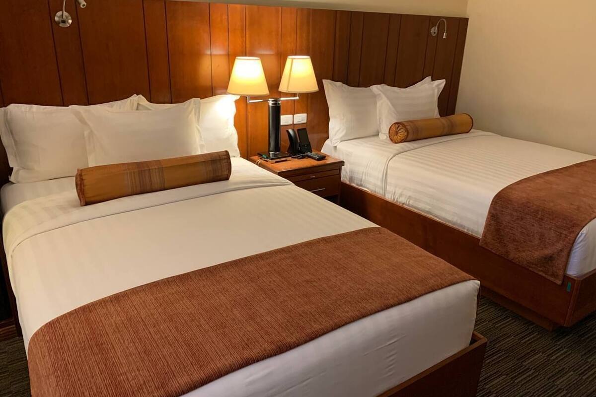 deluxe twin room, 2 double beds | 1 bedroom, minibar, in-room safe, desk