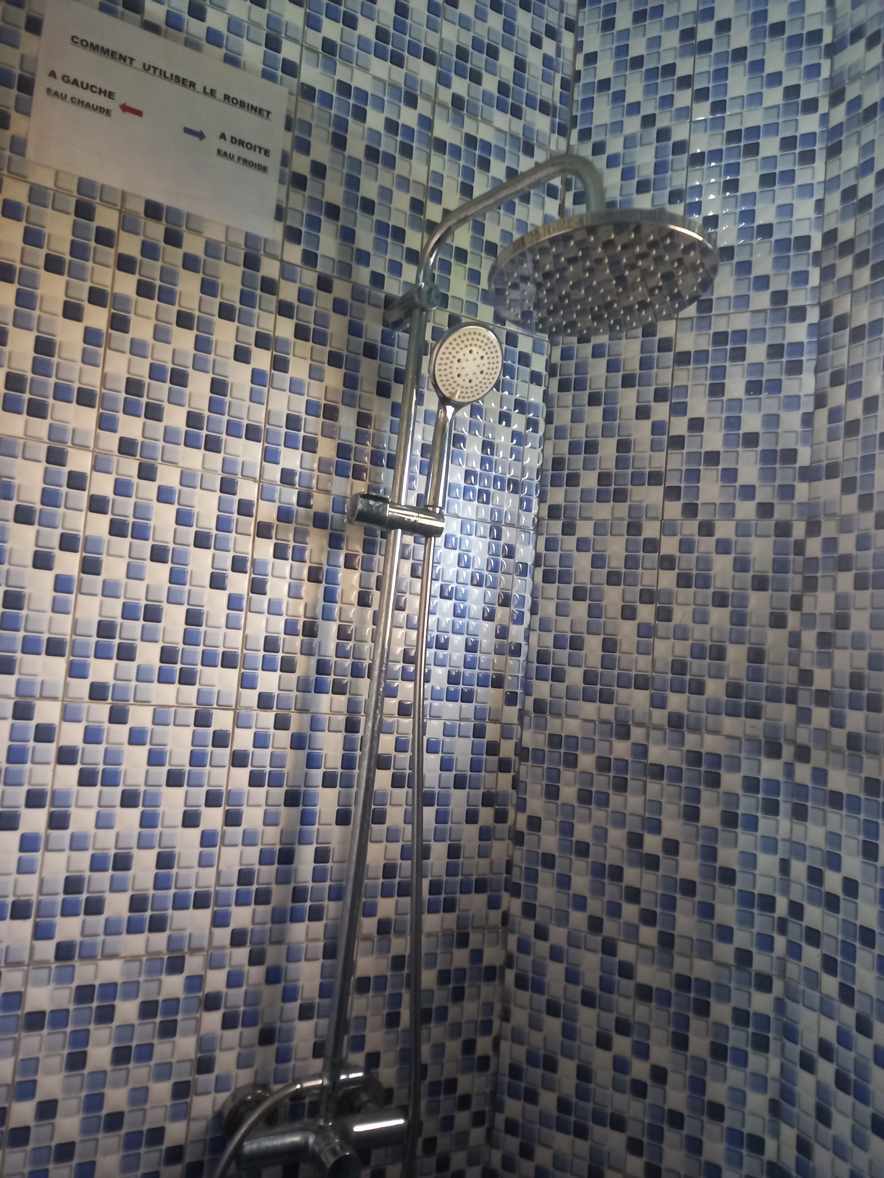 Bathtub, towels, soap, toilet paper