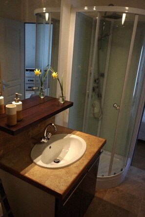 Shower, hair dryer, towels, soap