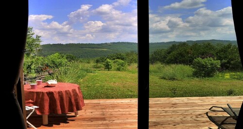 The Ensoleillade Ecological small wooden chalet of 19m2 in garden with view. 