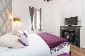 1 dormitorio, tabla de planchar con plancha, wifi y ropa de cama