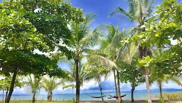 On the beach, sun loungers, beach towels