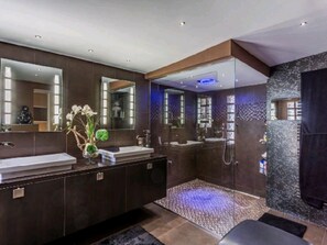 Shower, jetted tub, hair dryer, bidet