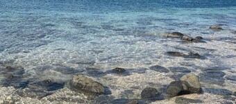 Walk to the beautiful Oualie Beach from this Beach Front Apartment