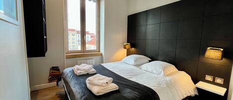 2 dormitorios, tabla de planchar con plancha, wifi y ropa de cama